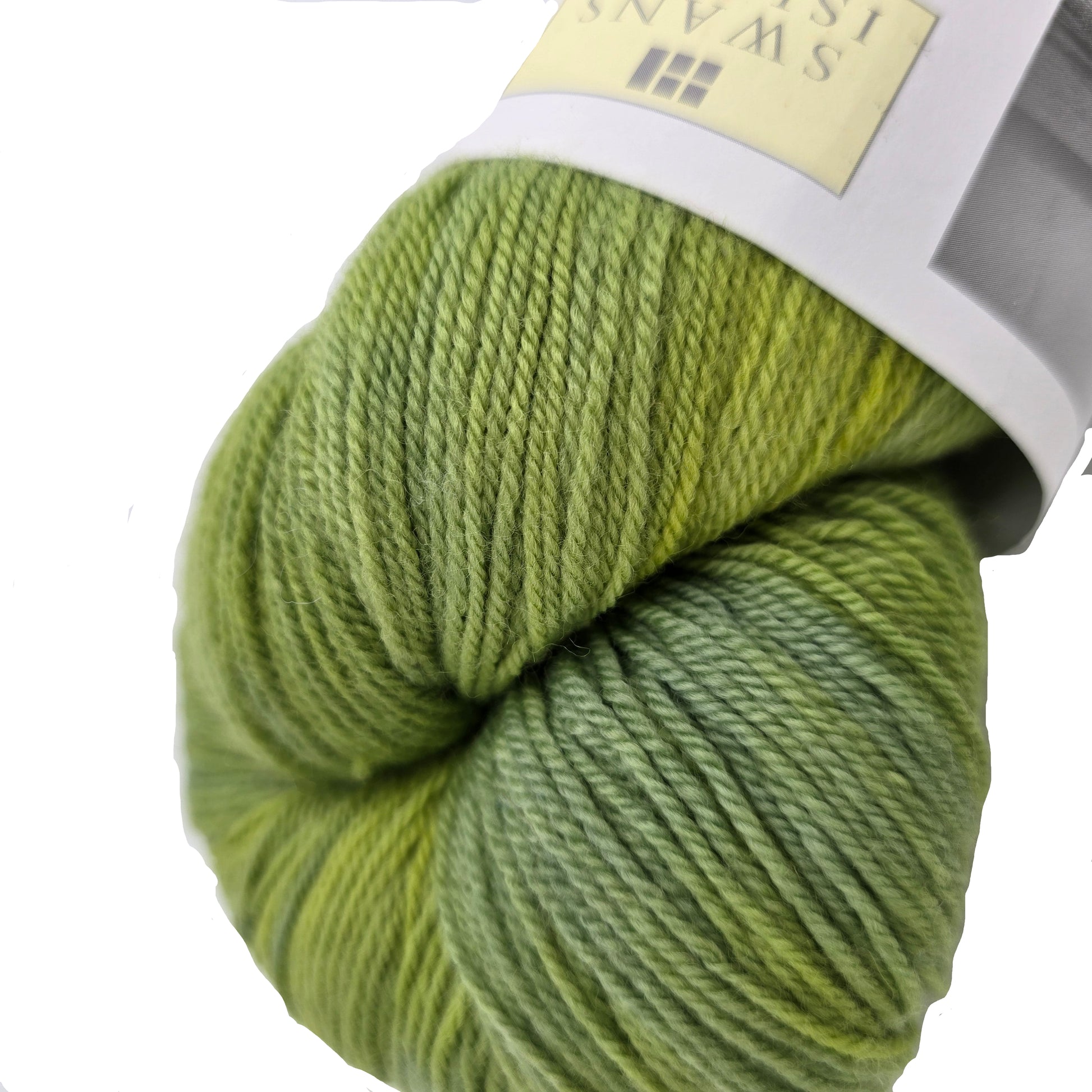 Close-up Image of Organic Merino_by_Swans_Island yarn in the color_Spring_Green_YF109 with partial label on a white background.