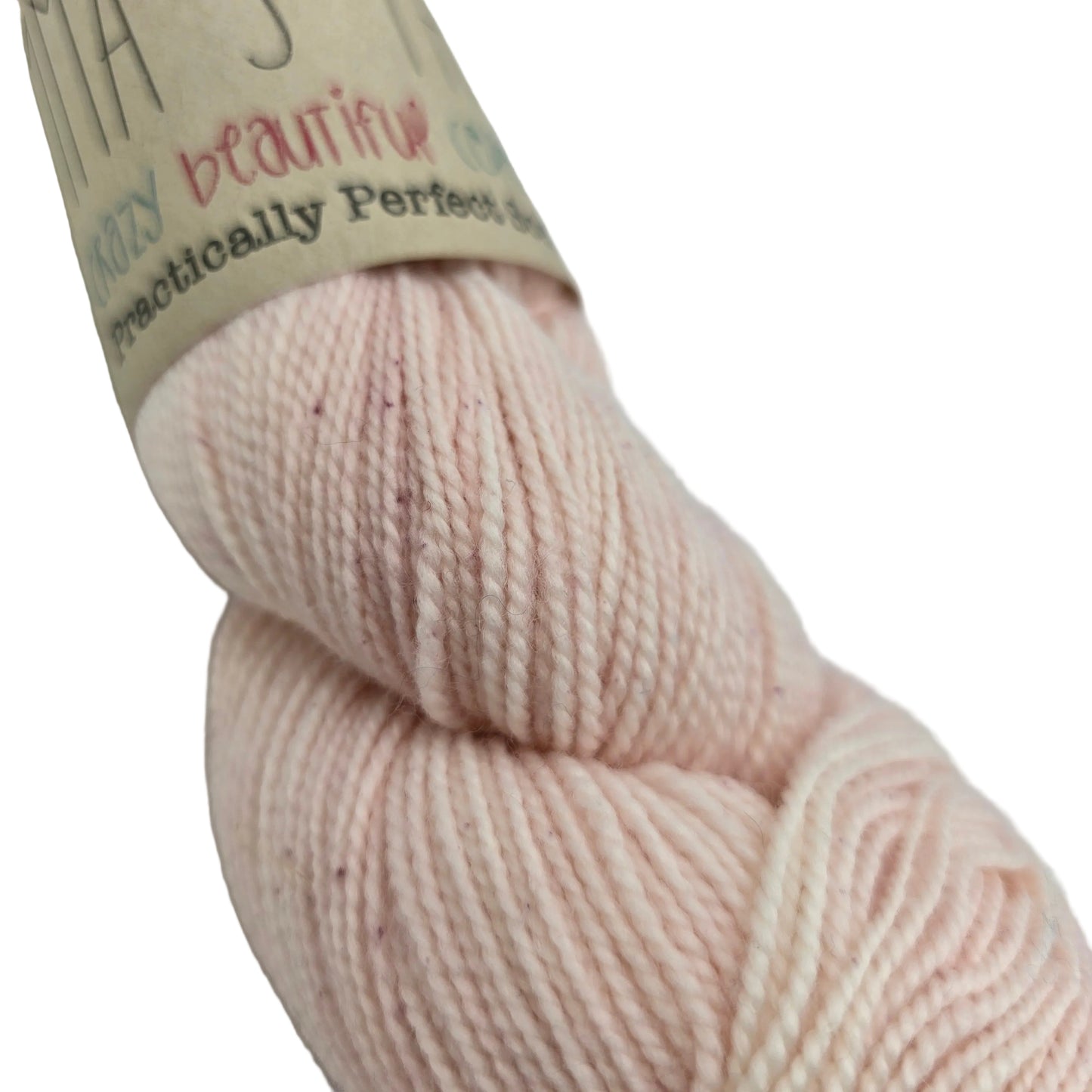 Close-up image of Practically_Perfect_Sock Yarn_by_Emma_s_Yarn_in the color_Sweet_Magnolia with partial label on a white background.