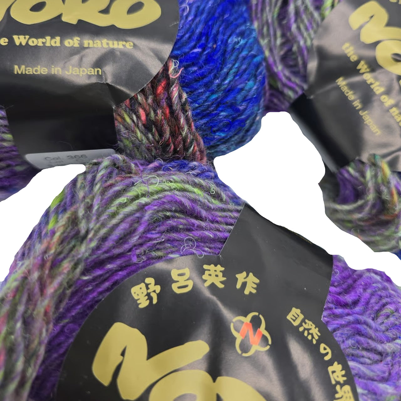 Close-up image of Silk Garden Yarn by Noro in Color 366 with partial labels on a white background.