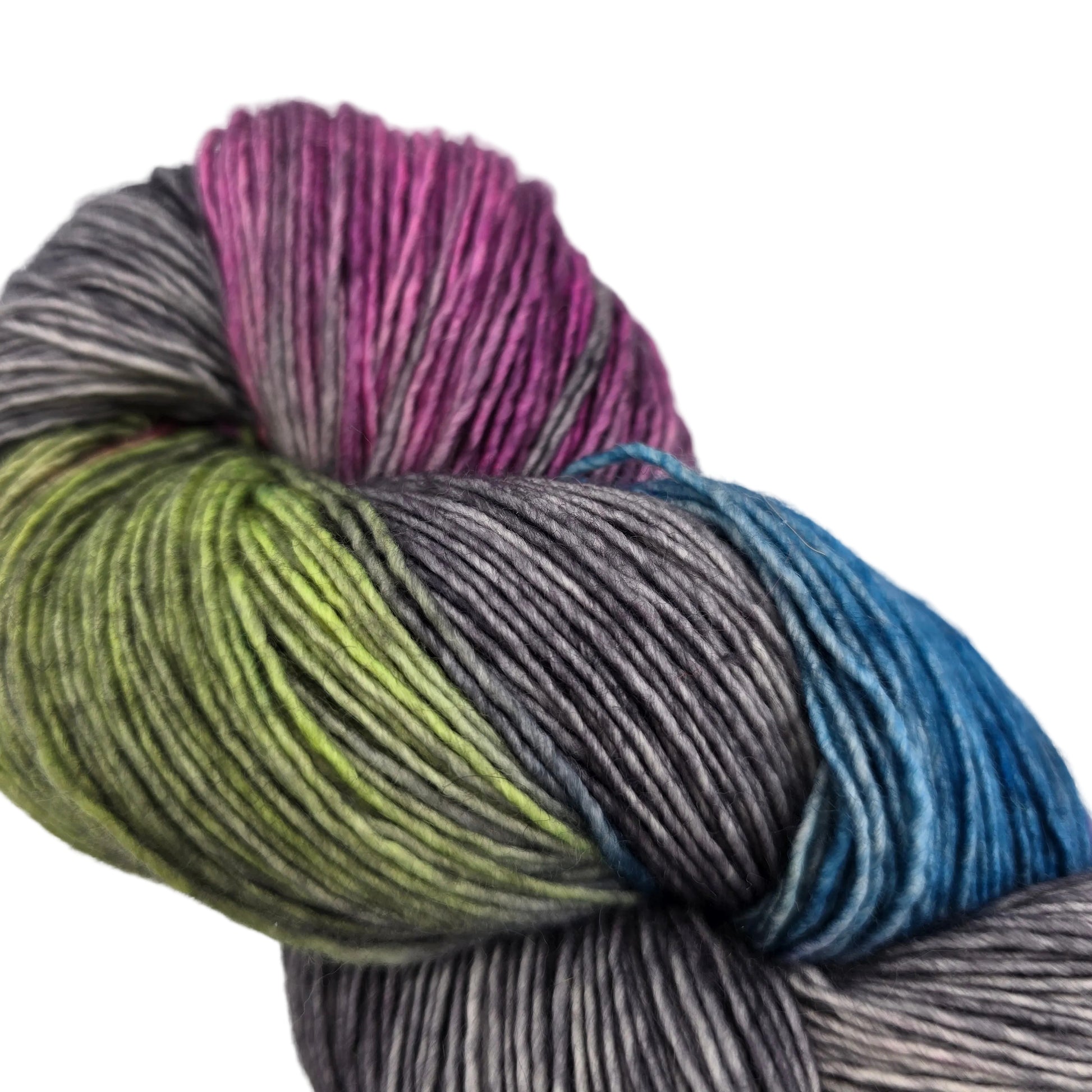 Close-up image of Tosh Merino Light yarn by Madelinetosh -in the color Night Hawk on a white background.