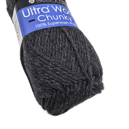 Close-up image of Ultra_Wool_Chunky_yarn by_Berroco in color 43113 grey with label on a white background.