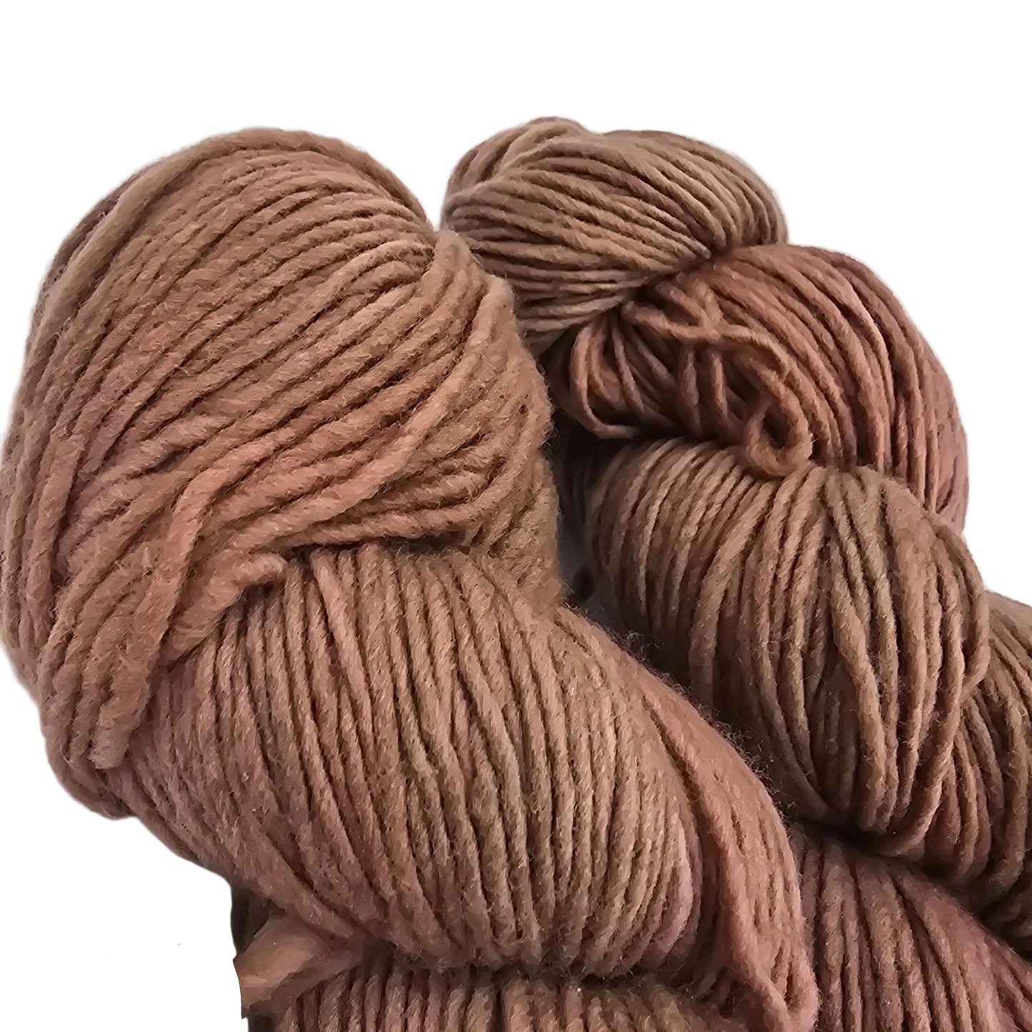 Close-up Image of two skeins of Worsted by Malabrigo Yarn in color 158 Cognac on a white background.