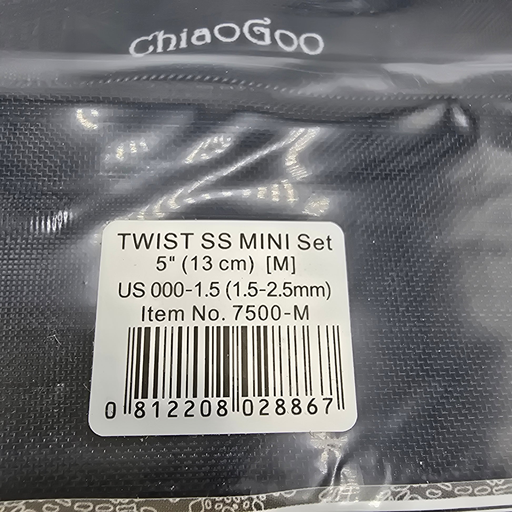 Close-up image of label on ChiaoGoo Twist Minis knitting needle set showing dimensions not visible background.