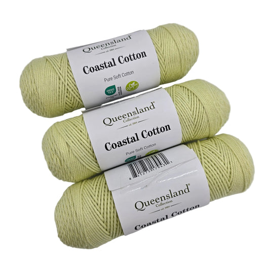 Image of three skeins of Costal Cotton Yarn by Queensland Collection in the color Celadon 1013 with label on a white background.