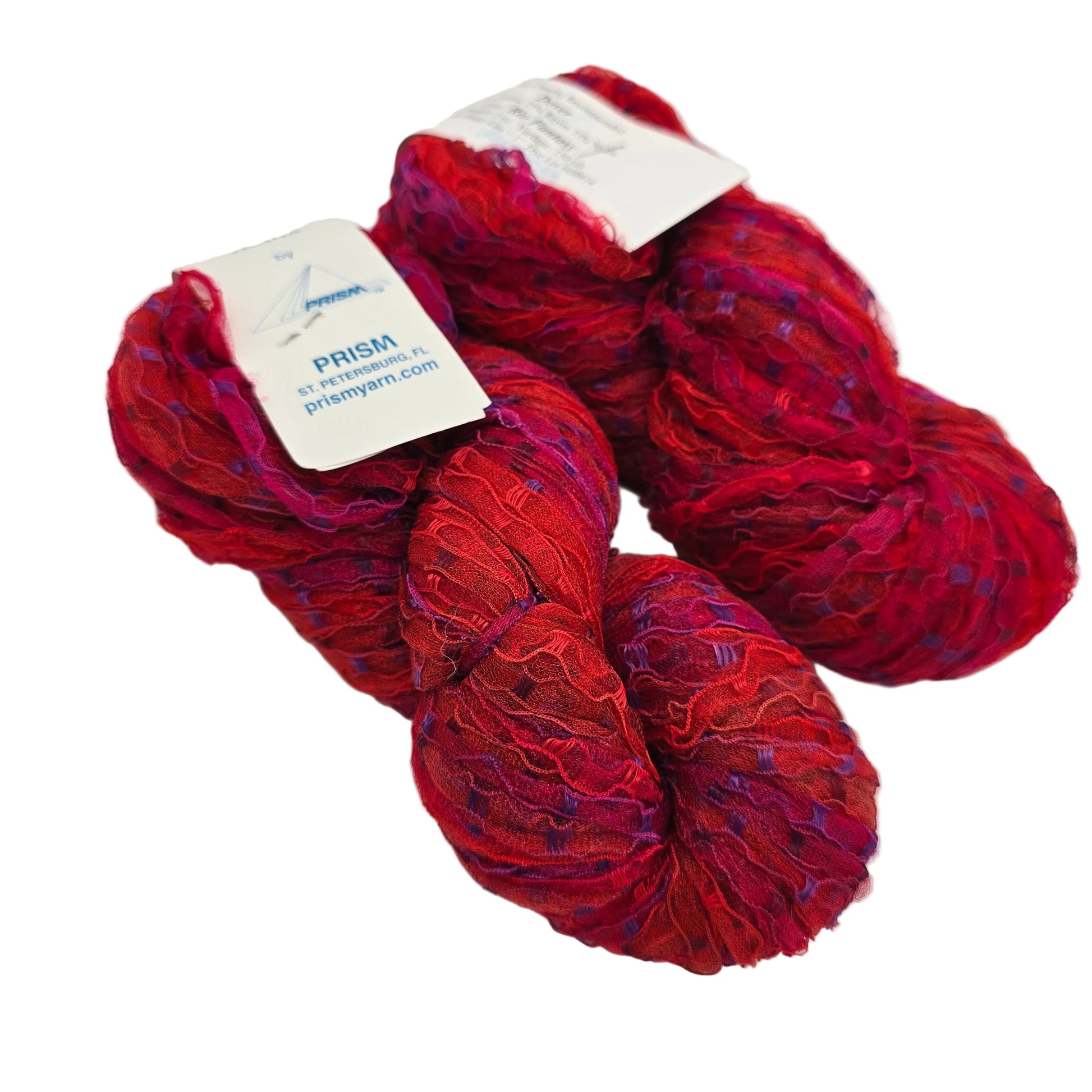 Image of two skeins of Dover by Prism Yarn in the color Rio Fantasy with labels on a white background.