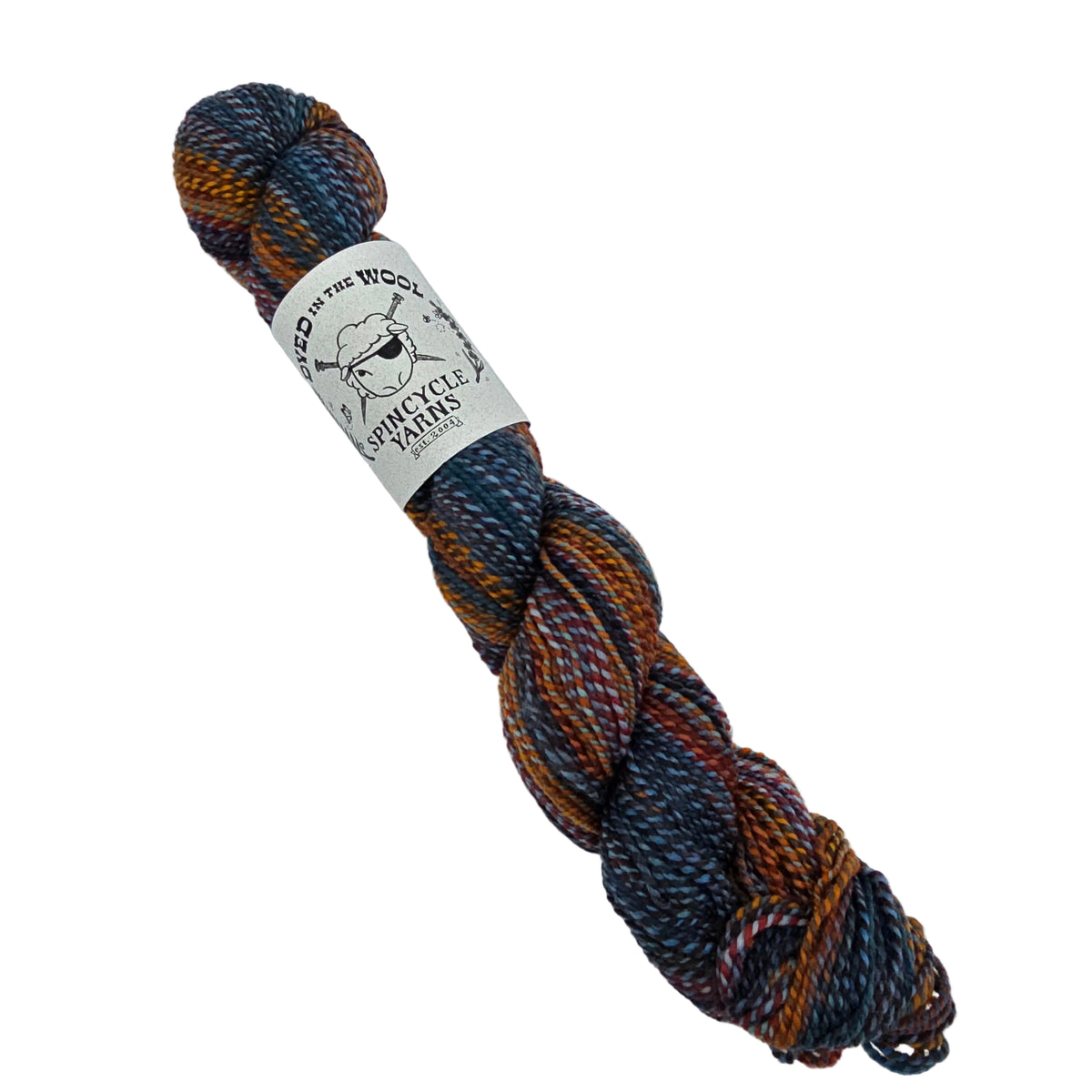 A skein of Dyed_in_Wool_yarn by_Spincycle_Yarns_in the color_Mississippi_Marsala a variegated yarn with blues and oranges with a white paper label on a white background.