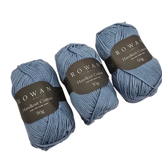 Image of three skeins of Handknit Cotton Yarn by Rowan in color 239 Ice Water with labels in a white background.