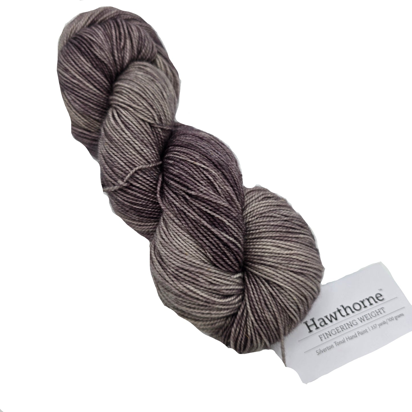 Image of a single skein of Hawthorne Fingering Weight Yarn by Knit Picks in the color Silverton Tonal Paint with label on a white background.