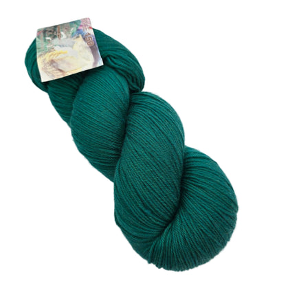 Image of a single skein of Heritage 150 Sock Yarn by Cascade Yarns in the color Ultramarine Green with label on a white background.
