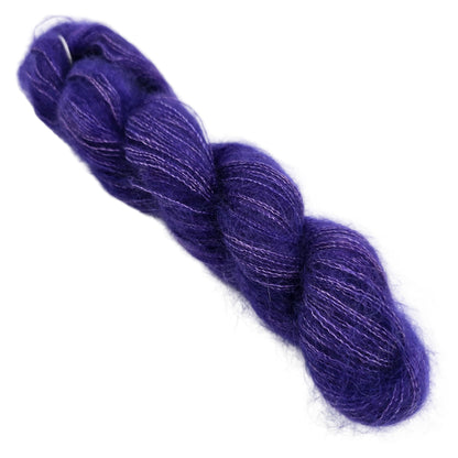 Image of a single skien of  Isle of Skye by Jorstad in the color Violet Femmes 0920 on a white background.