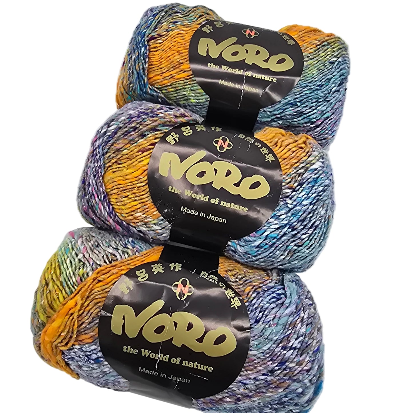 Image of three skeins of Kibou by Noro Yarn in Color 4 with labels on a white background.