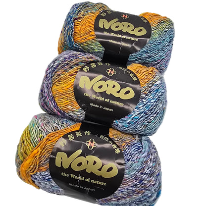 Image of three skeins of Kibou by Noro Yarn in Color 4 with labels on a white background.