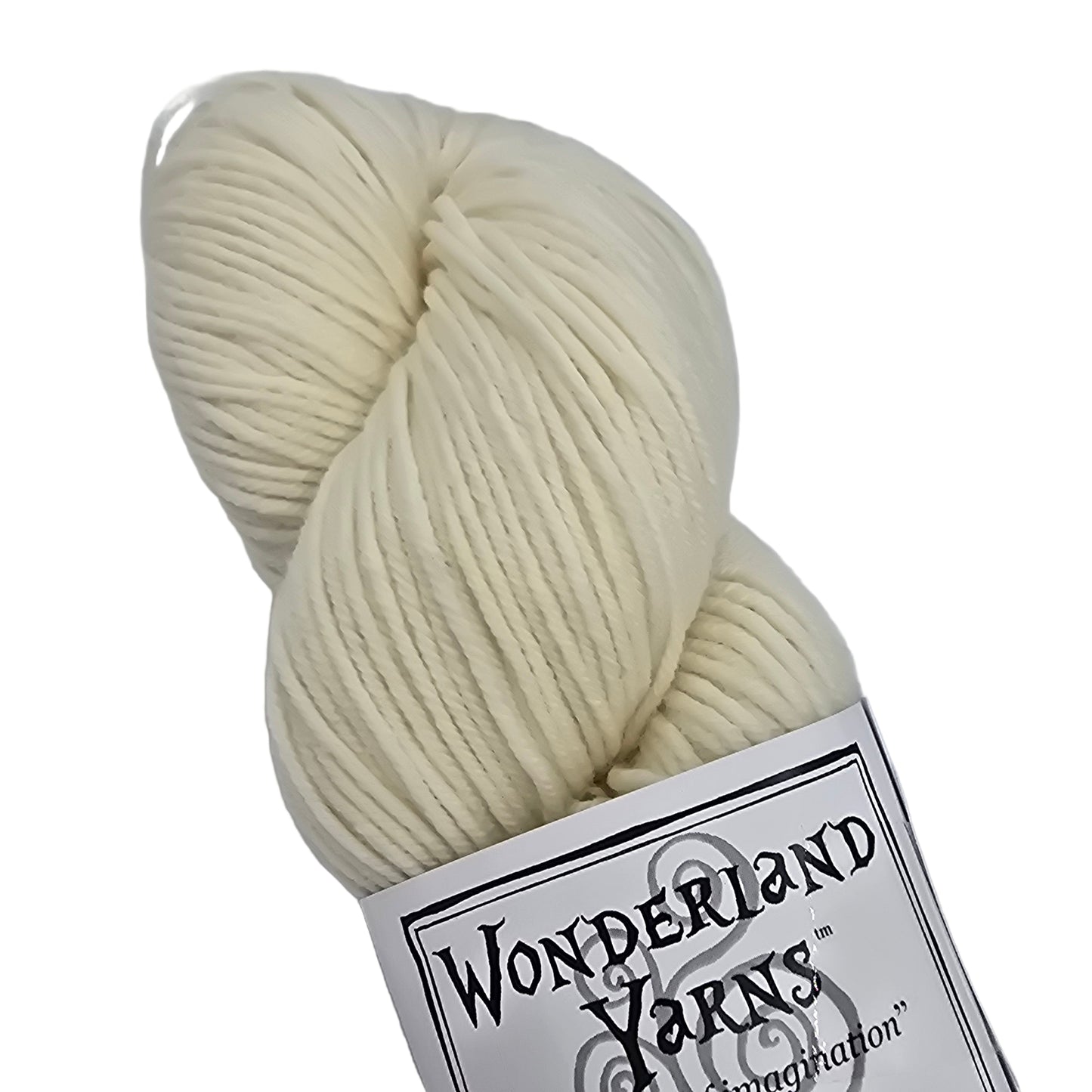 Image of a single skein of Mad Hatter by Wonderland Yarns in the color white rabbit which is a cream with a label on a white background.