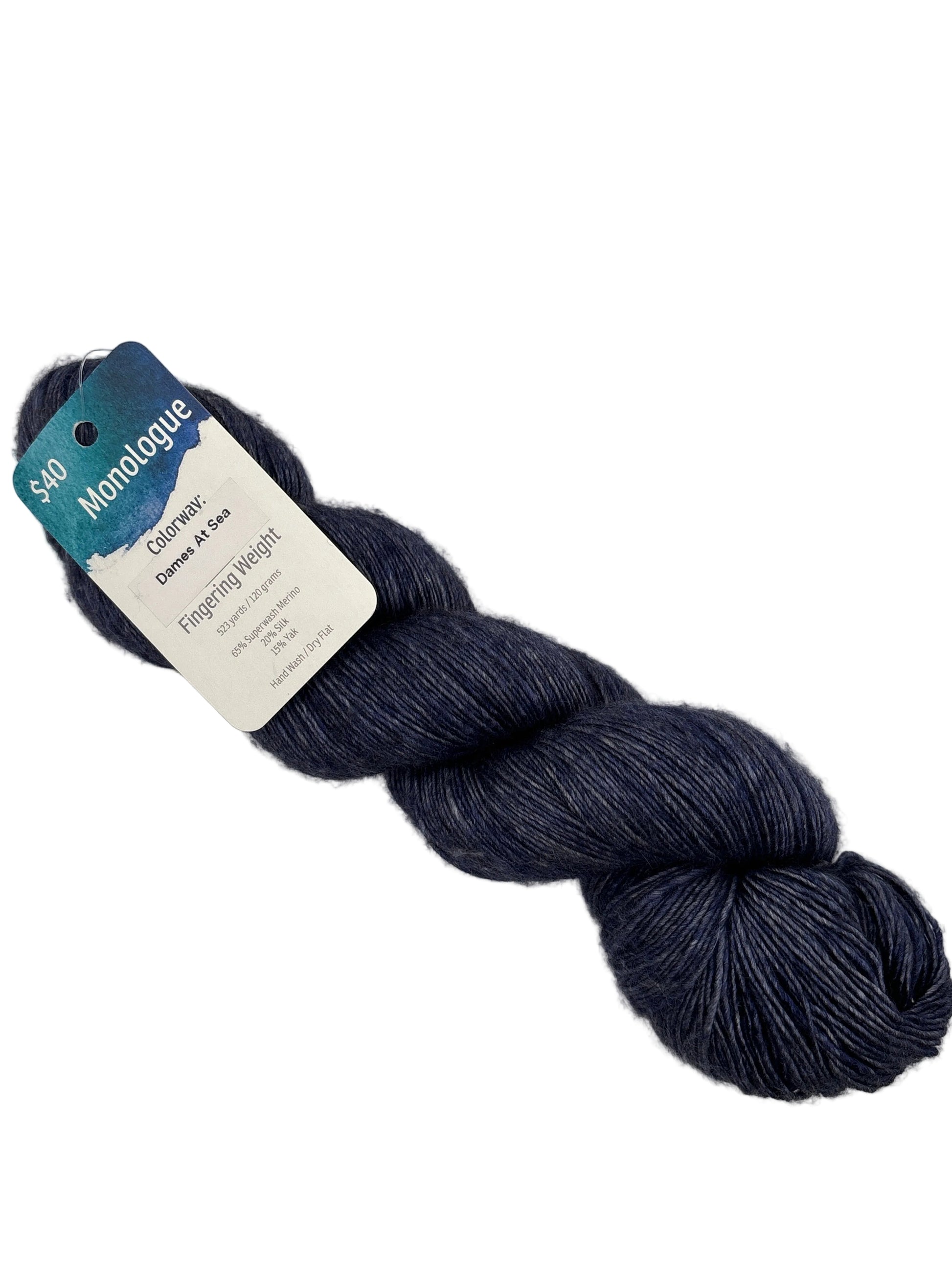 Image of a single skein of Monologue yarn by Leading Men Fiber Arts in the color Dames at Sea with label on a white background.
