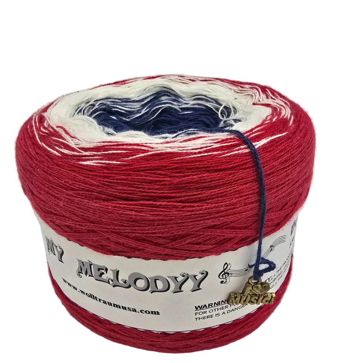 A cake of variegated yarn with red, white, and navy blue color sections, wrapped in a white paper label on a white background.