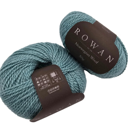 Image of two balls of Norwegian Wool by Rowan in color 022 Mountain with labels on a white background.