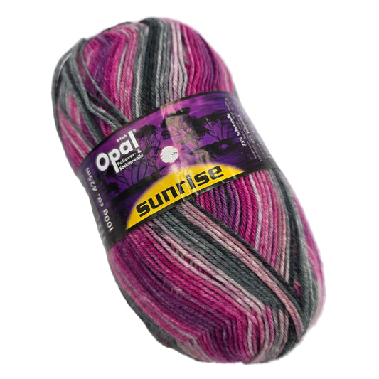 Image of a single skein of Opal Sunrise 4-Ply Sock Yarn in Color 9441 with label  on a white background.
