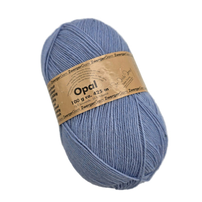 Image of a single skein of Opal Uni Solid yarn by Opal in Color 27 with label on a white background.