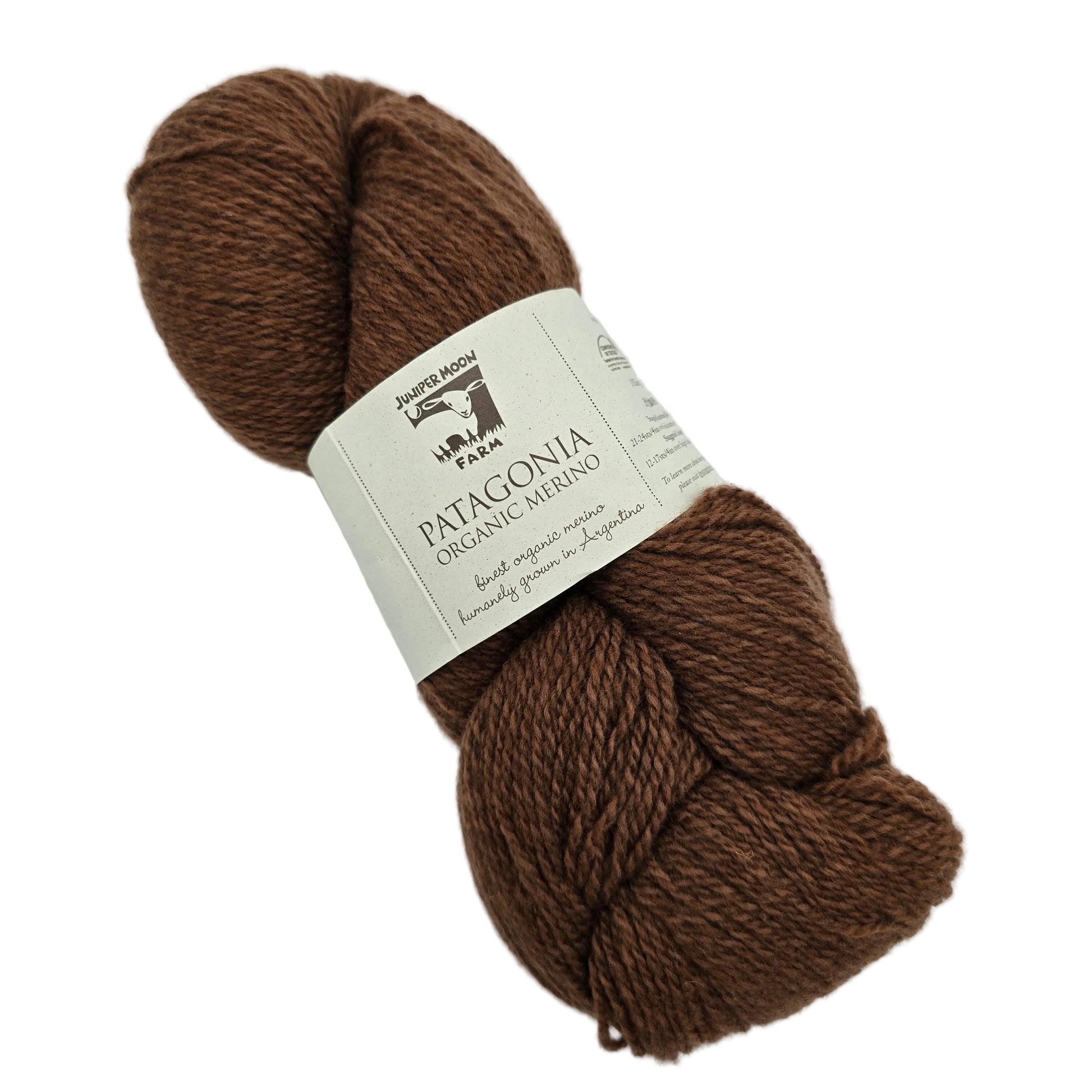 Image of a single hank of Patagonia Organic Merino Wool Yarn by Juniper Moon Farm in the color Sequoia with label on a white background.