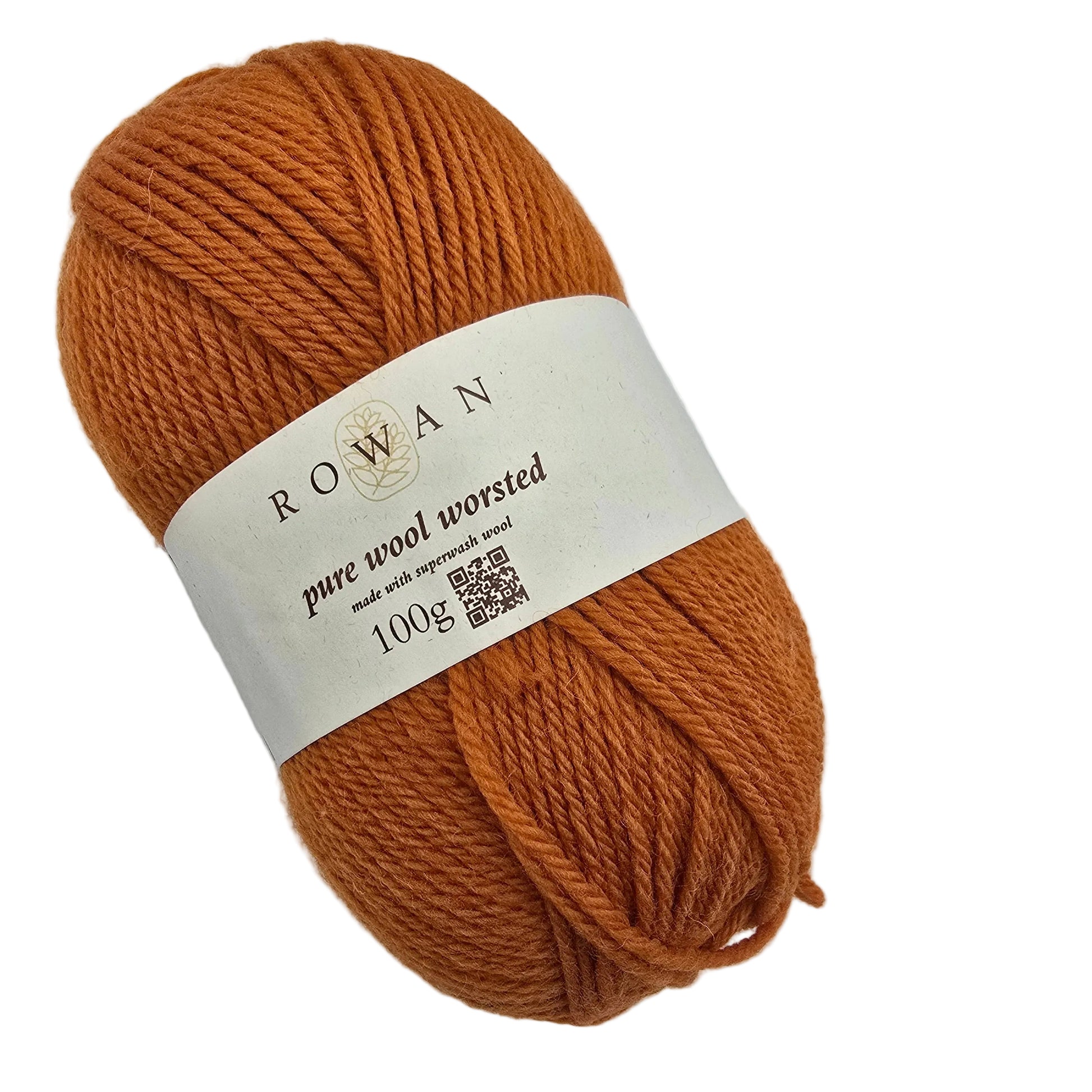 A skein of Rowan Pure Wool Worsted yarn in color 00134 a warm rust orange color, wrapped with a white paper label, on a plain white background.