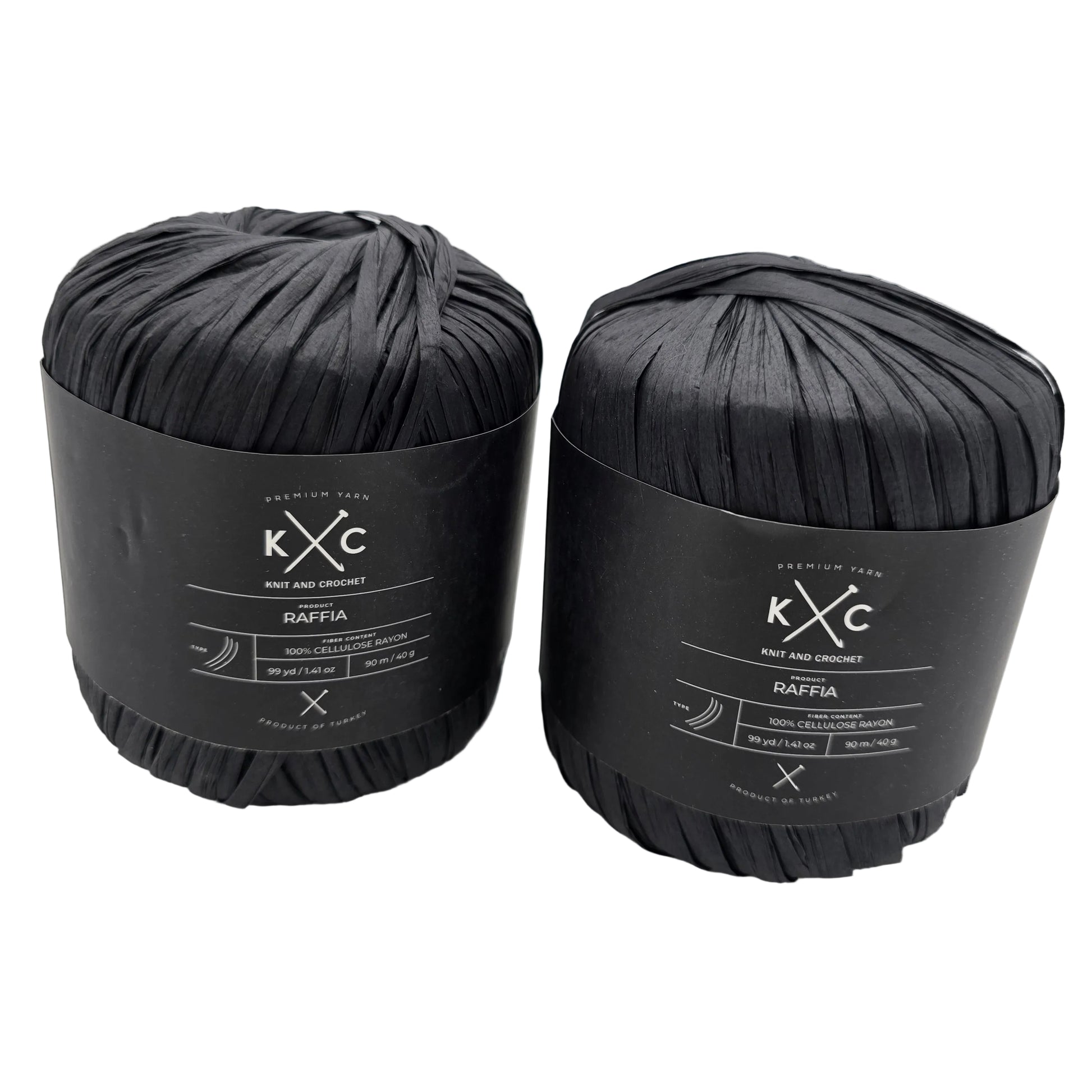 Image of two flat pull skeins of Raffia by Yarn K+C in black with labels on a white background.