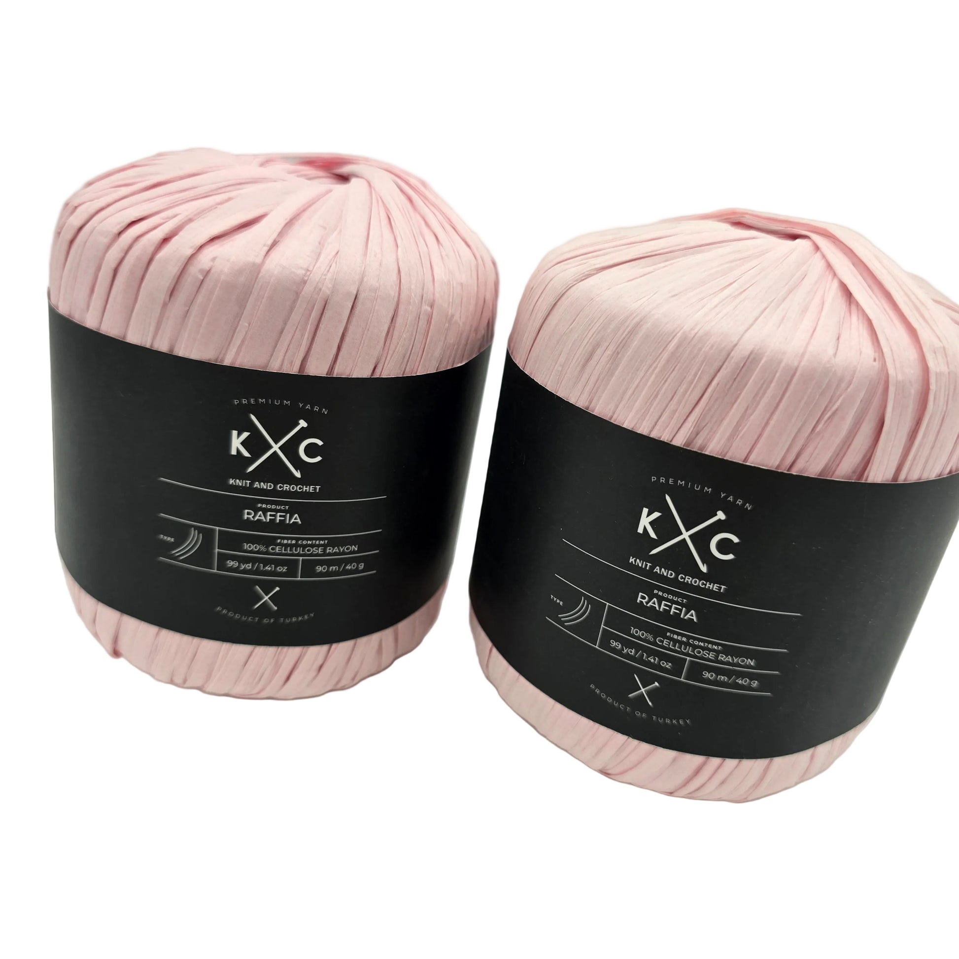 Image of two flat pull skeins of Raffia yarn by K+C in the color pink dk on  with labels on a white background.
