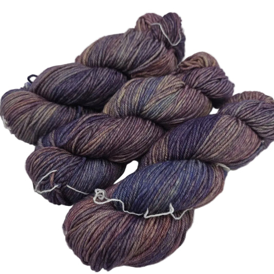 Image of three skeins of Rios by Malabrigo Yarn in color  841, Tranquilo  on white background.