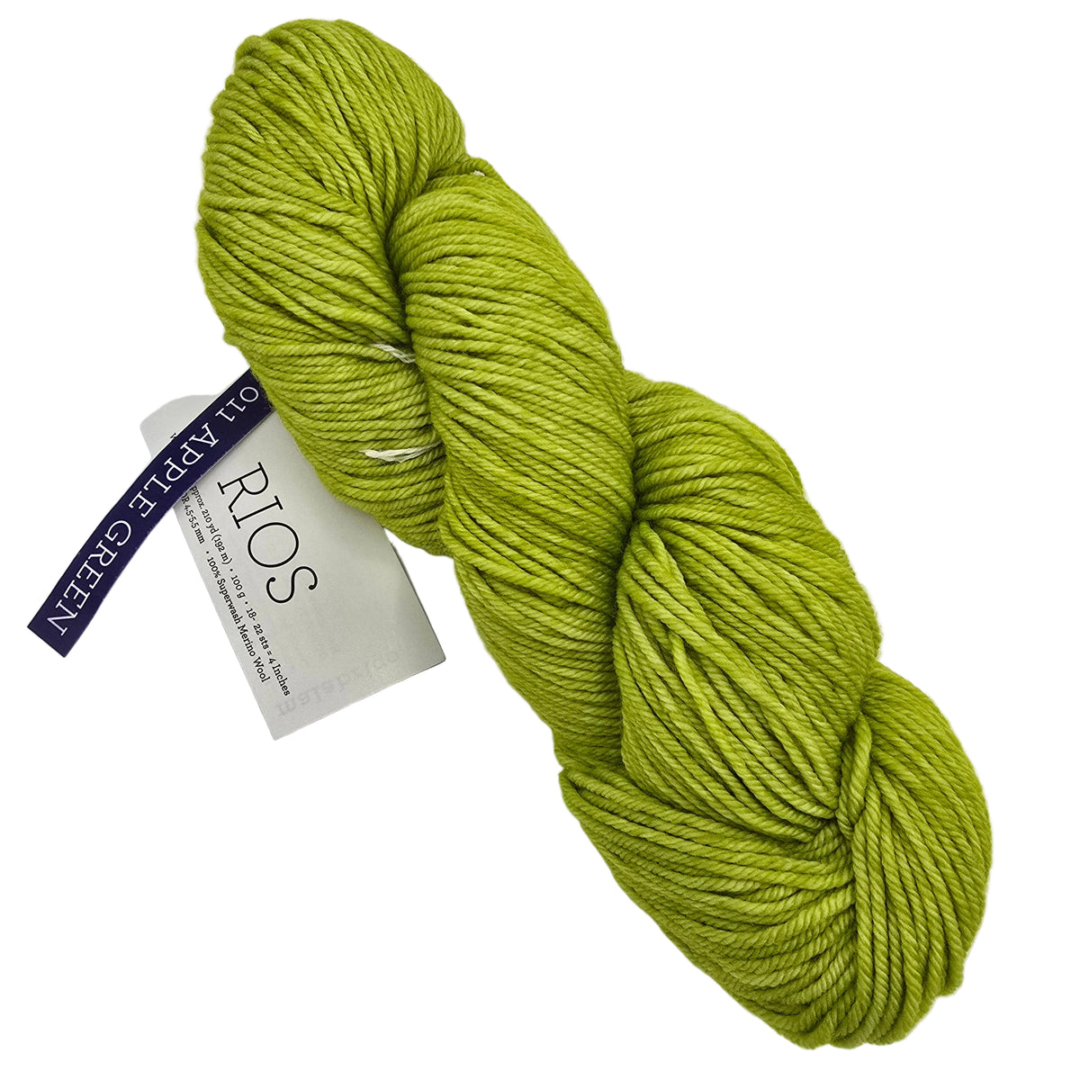 Image of a single skein of rios by malabrigo yarn in the color 001 apple Green with label on a white background.