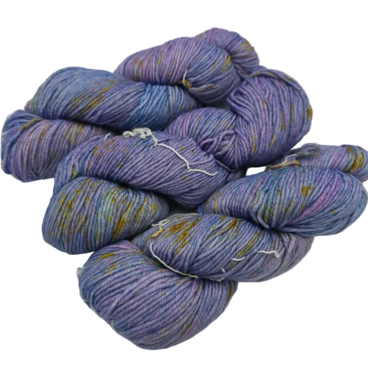 Image of three skeins of Rios by Malabrigo Yarn in color 289 Pisces on a white background.