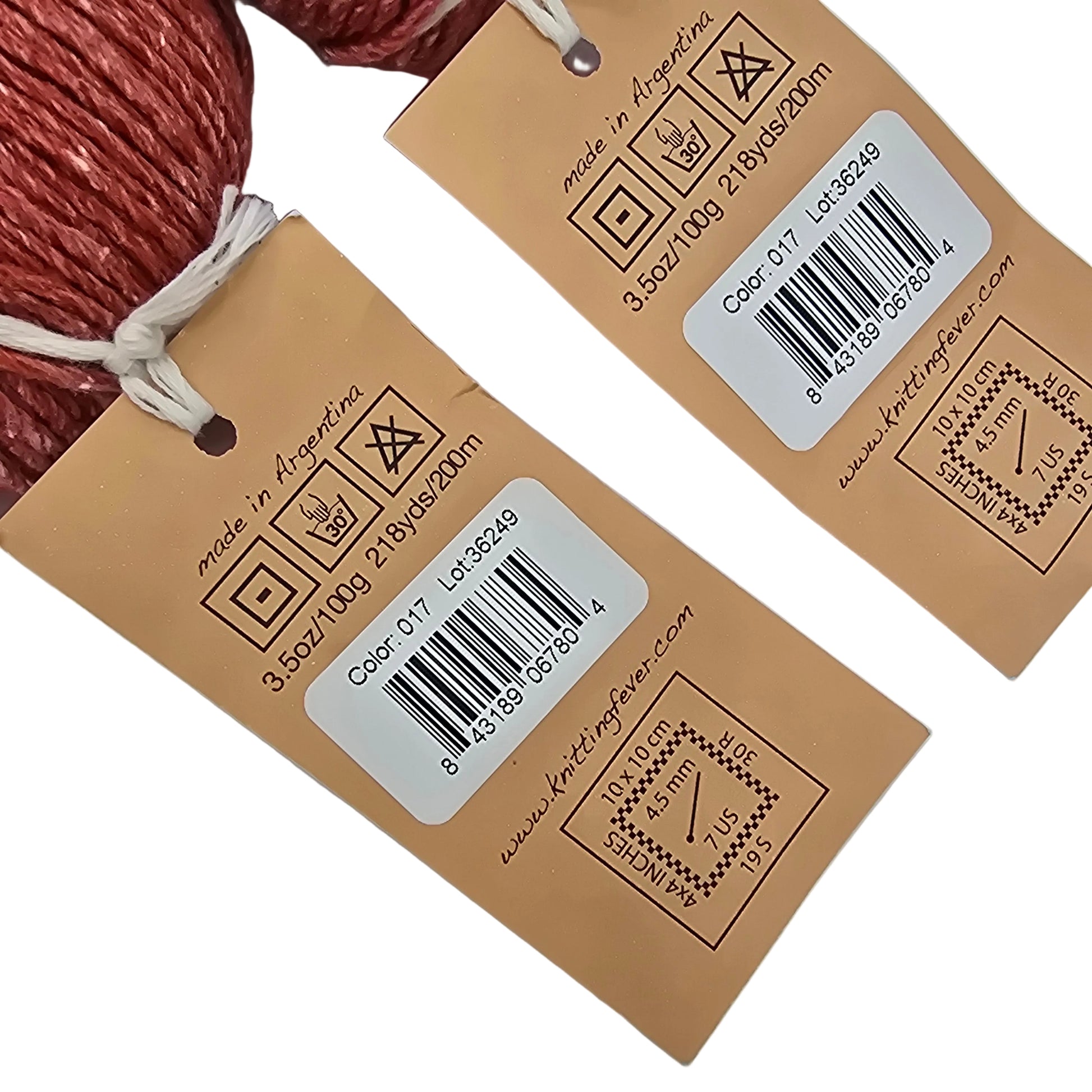 Two brown product tags with barcodes and symbols on a light gray background