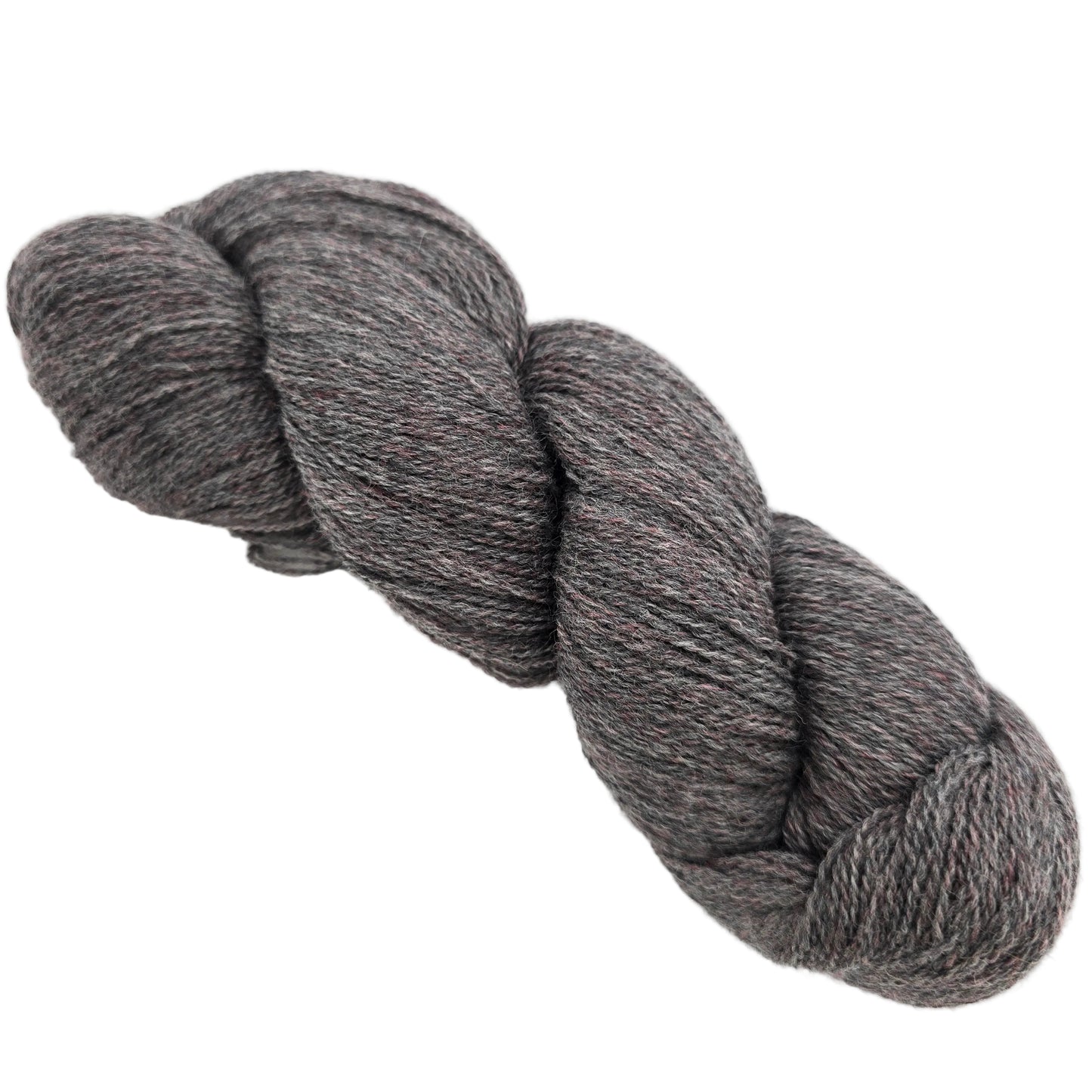 Image of single skein of Shadow Heathered yarn by Knit Picks in the color shadow Basalt on a white background.