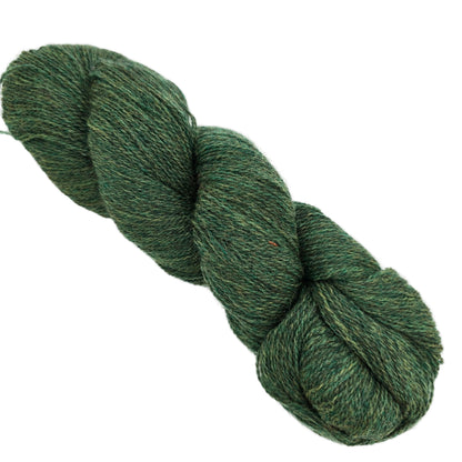 Image of a single skein of Shadow Heathered yarn by Knit Picks in the color Shadow Forest  Heathered  on a white background.