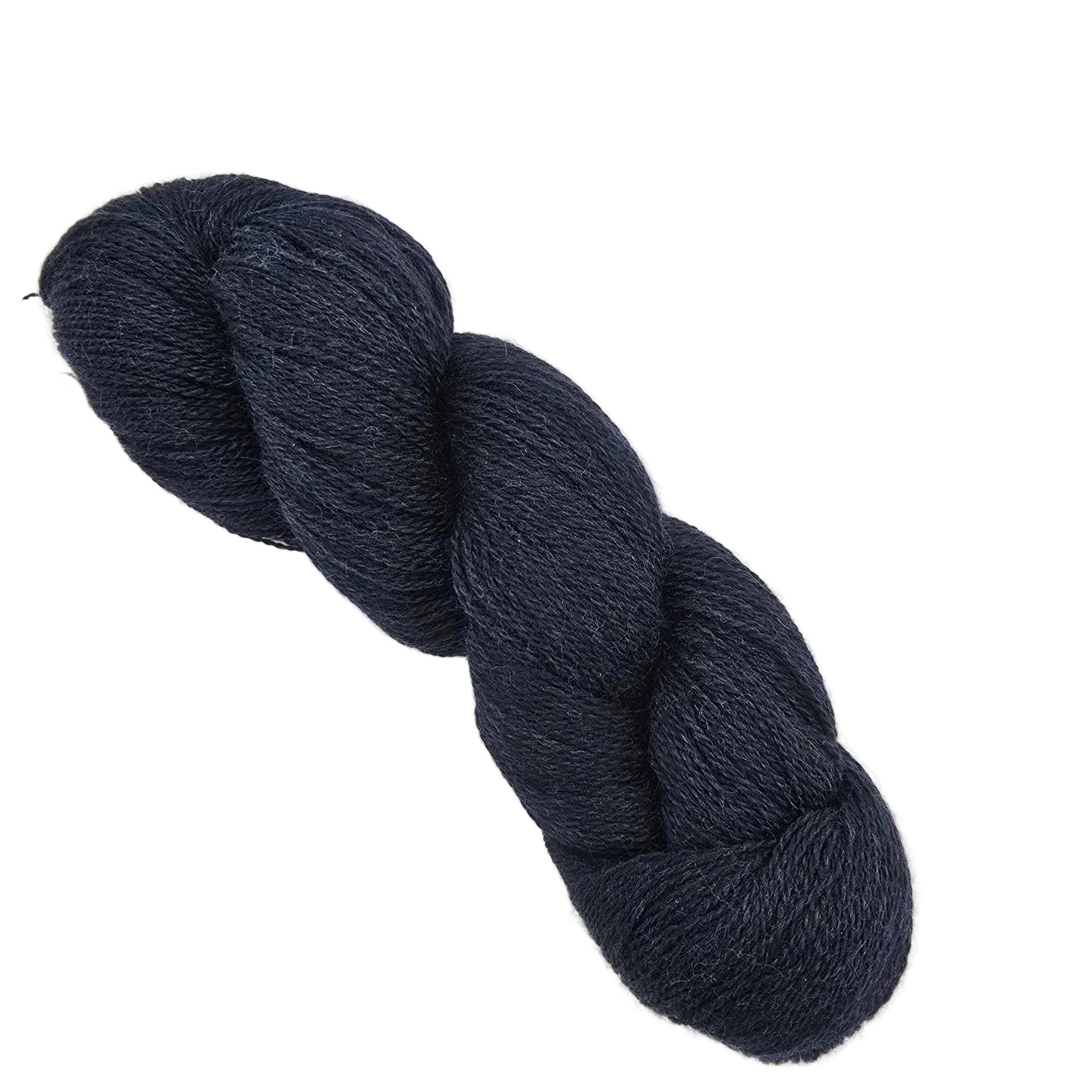 Image of a single skien of Shadow Heathered by Knit Picks yarn in the color shadow midnight on a white background.