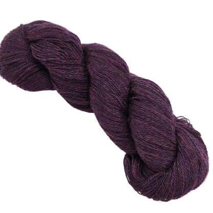 Image of single skein of Shadow Heathered Yarn by Knit Picks in the color shadow vineyard on a white background.
