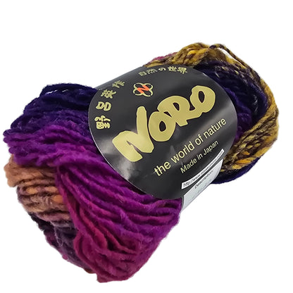 Image of a single skein of Kureyon by  Noro Multicolor Yarn in color 138 with label on a white background.