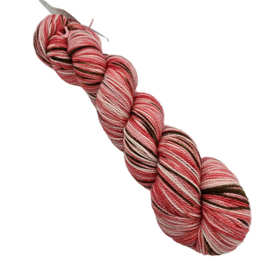 Image of a single hank of Sock Yarn by Sundara Yarn in the color Cherry Blossom with label on a white background.