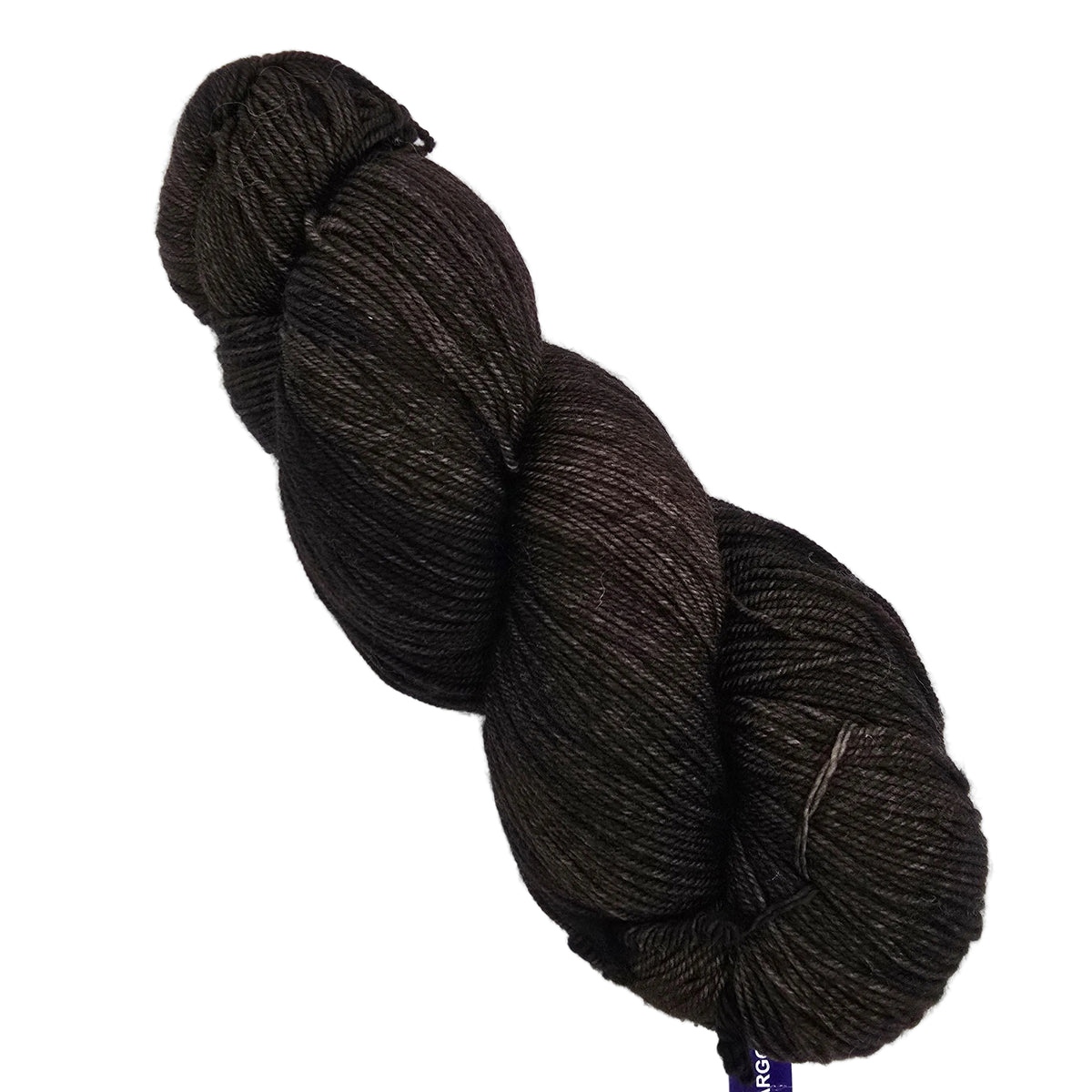 A skein Sock Yarn by Malabrigo in  color 812 Chocolate Amargo a dark brown yarn with subtle charcoal and black heathering, shown on a plain light background with a small paper tag attached.