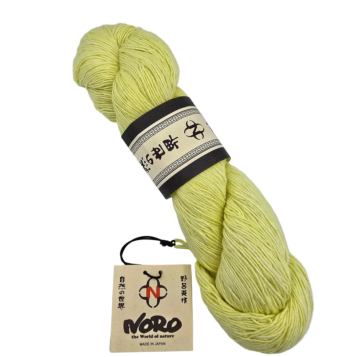 A skein of Sonata_yarn by_Noro_-in Color_33 a pale yellow yarn with a dark brown and cream paper label on a white background.