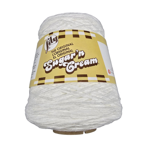 A large spool of fluffy white yarn with a retro yellow label reading 'Lily Sugar'n Cream' on a plain white background.