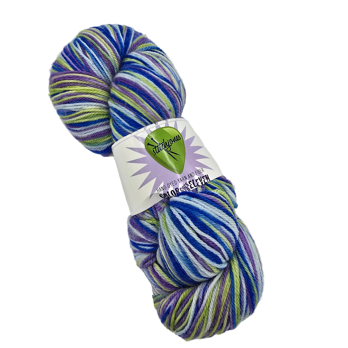 A skein of variegated yarn with stripes of blue, purple, green, and white, wrapped in a white paper label on white background.