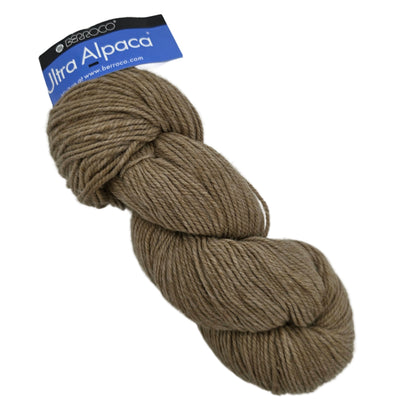 Image of a single skein of Ultra Alpaca Yarn by Berroco in color 6202 Tan with label on a white background.