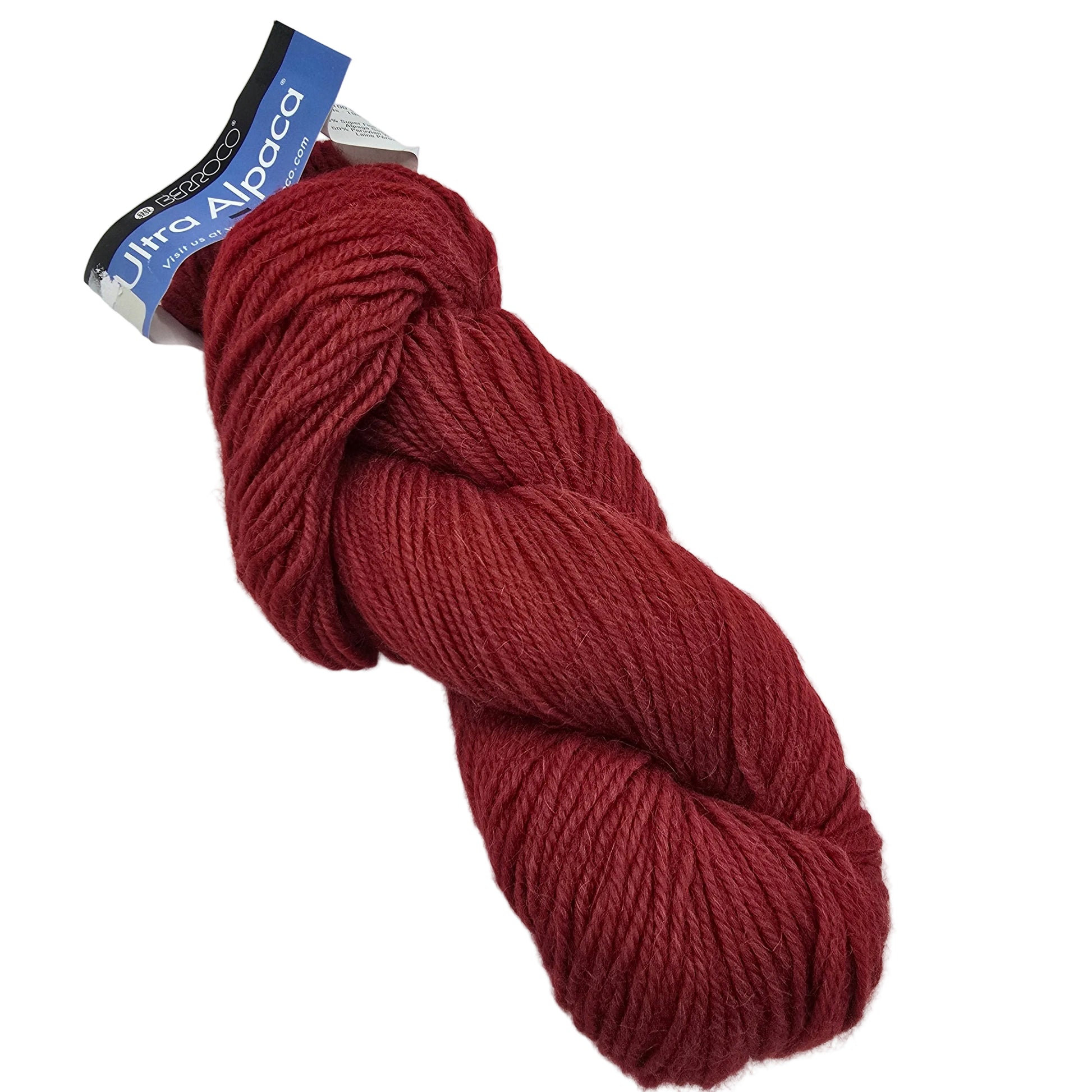 A skein of Ulla Alpaca yarn by Berroco in color 6324 Cardinal a muted burgundy shade, with its blue and white brand tag attached, photographed on a white background.