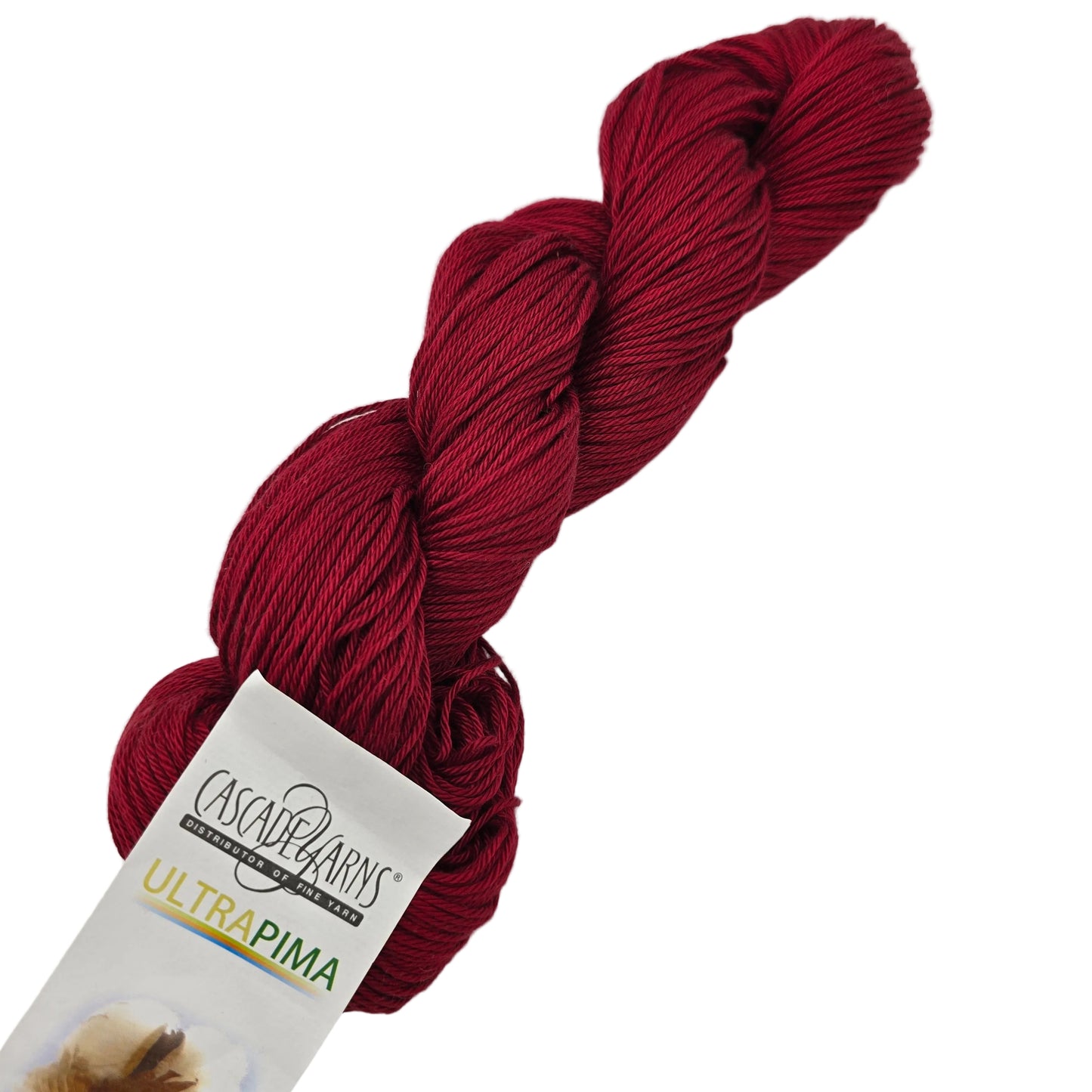 Image of a single skein of Ultra Pima Yarn by Cascade in Color 3713 Red with label on a white background.