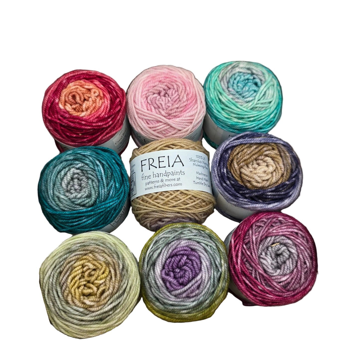 Image of 9 mini skeins of yarn in multiple difference colors from Minikins Zaizan Scarf Pack by Freia in the color selection Baby's Breath on a white background.