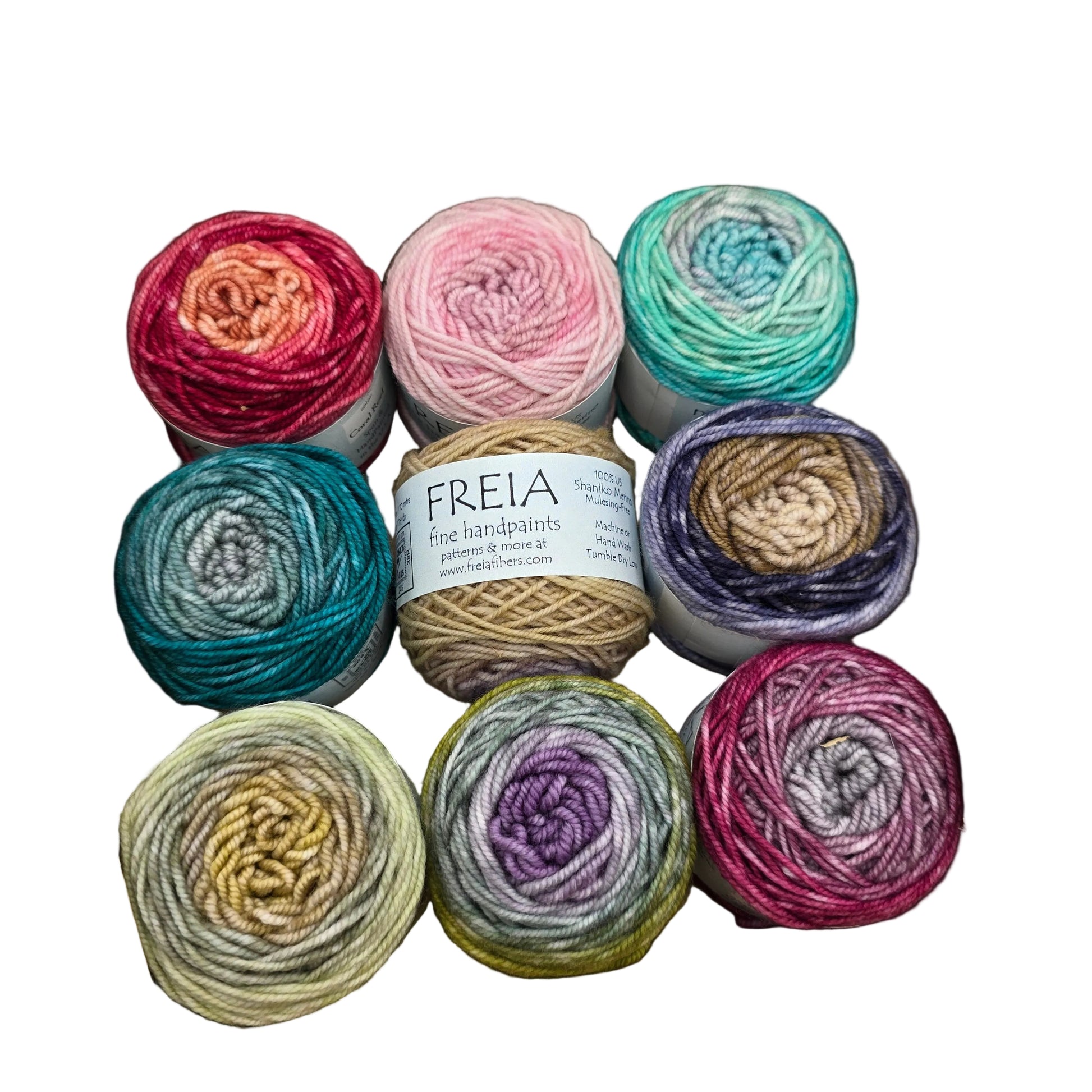 Image of 9 mini skeins of yarn in multiple difference colors from Minikins Zaizan Scarf Pack by Freia in the color selection Baby's Breath on a white background.