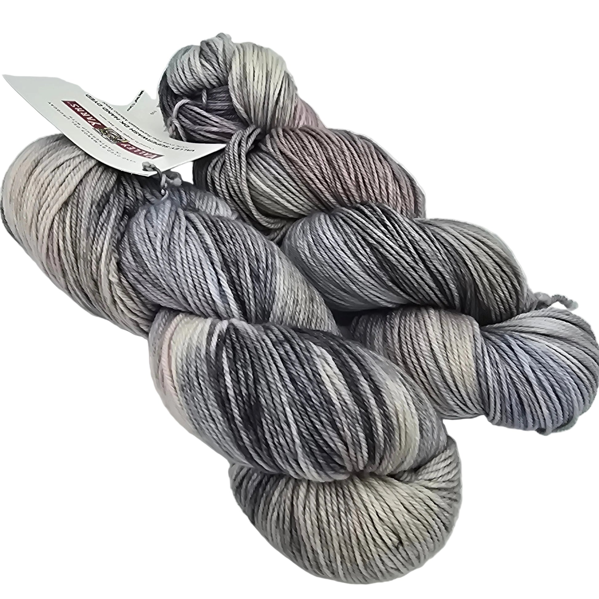 two skeins of color number 2, Fog valley superwash DK yarn by manos del Uruguay and Valley Yarns on a white background with label.