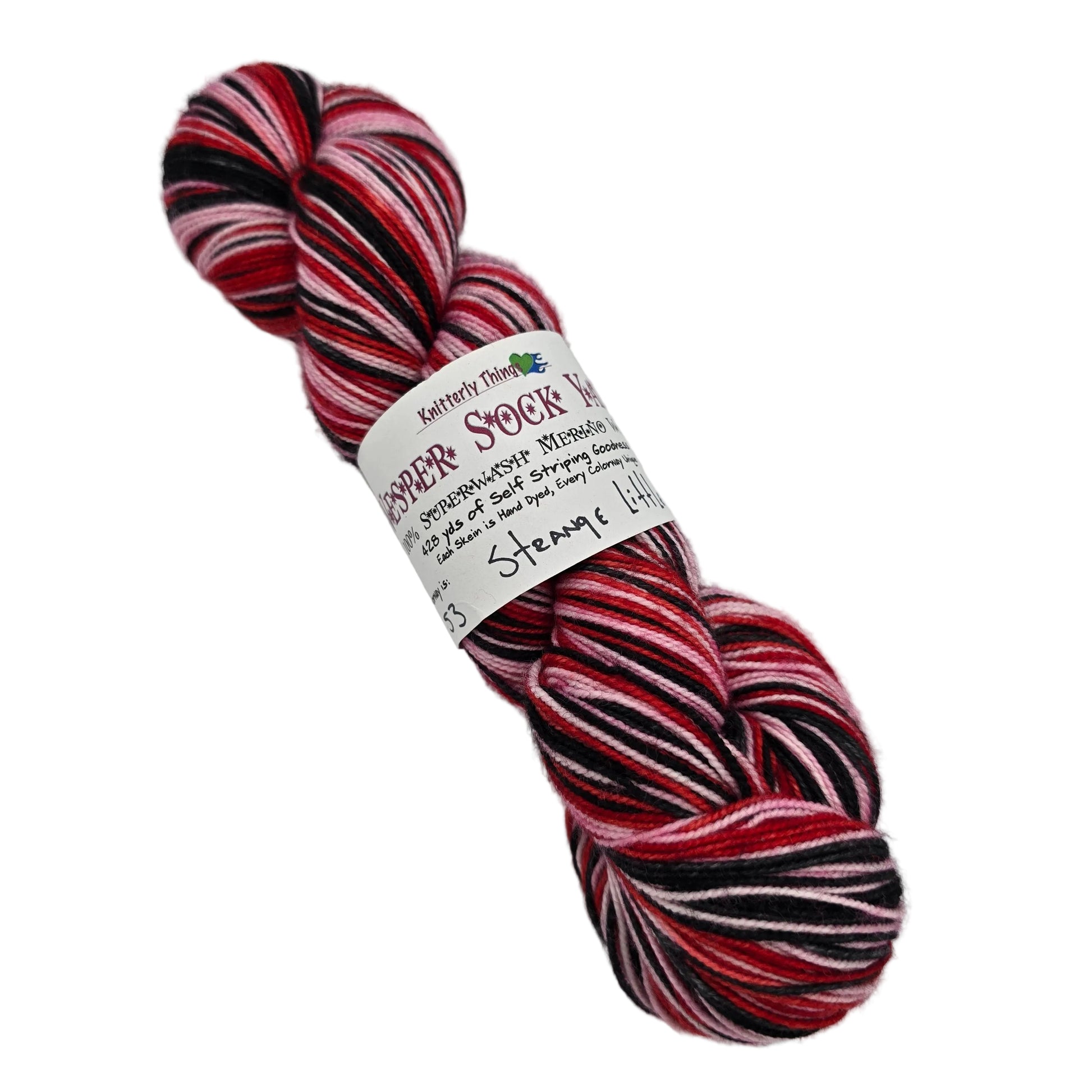 Image of a single skein of Vesper Sock Yarn by Knitterly Things in the color  Strange Little Mama with label on a white background.