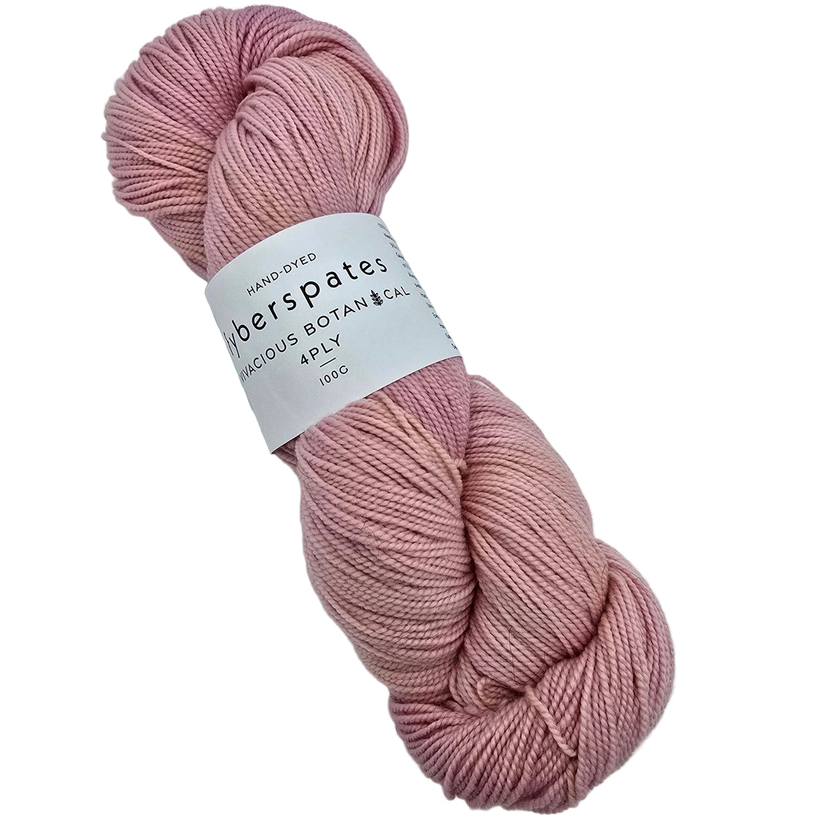 A skein of hand-dyed Vivacious_Botanicals_4ply yarn_by_Fyberspates_in the color Peach_Melba a dusty pink shade with label on a white background.