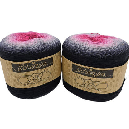 Image of two cakes of gradient Whirl by Sheepjes in the color called ight time bubbles that transitions from black to white to pink with labels on a white background.