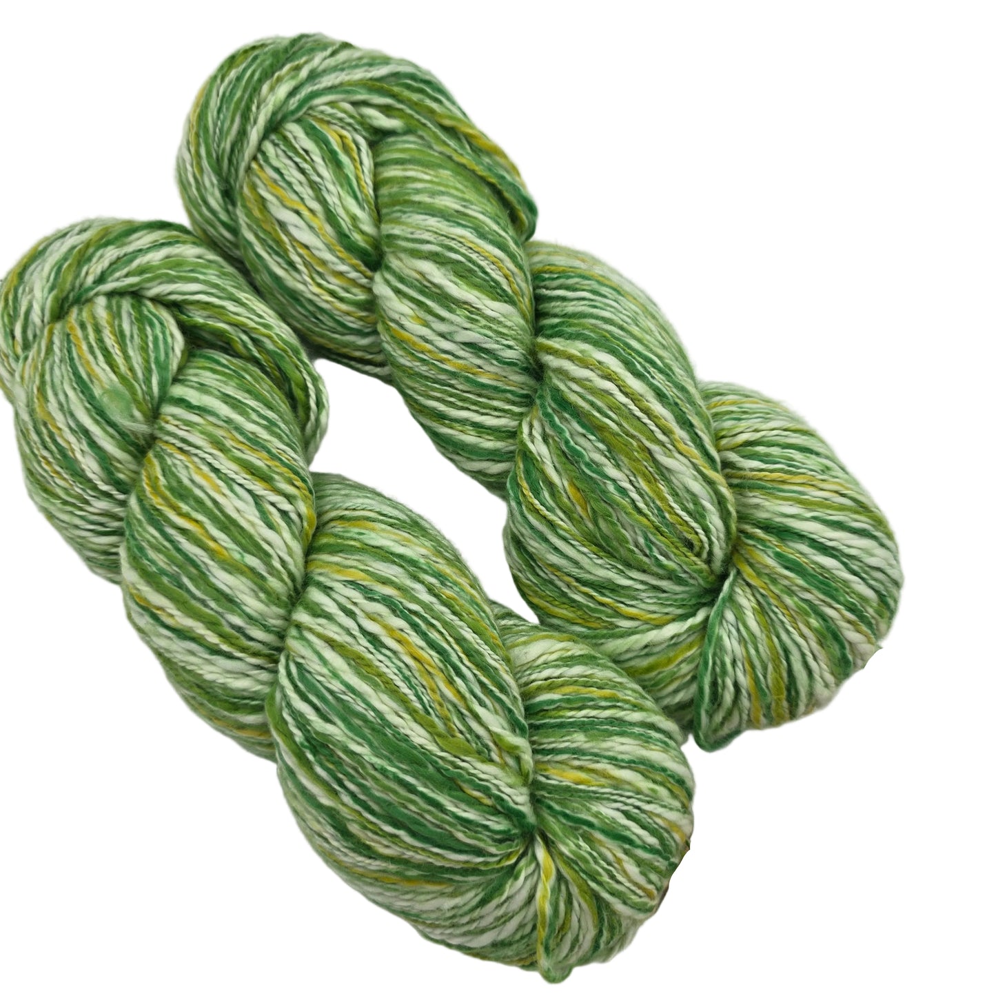 Image of two hanks of Winqu Alqa yarn by Mirasol Yarn in Color 1009 on a white background.